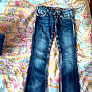 Rock rival, dark blue jeans